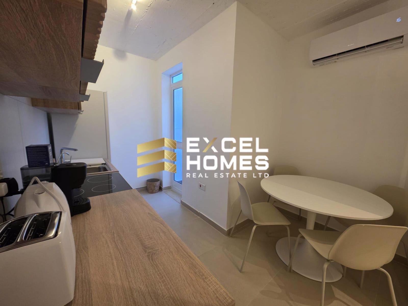 2-bedroom penthouse to let in Buġibba